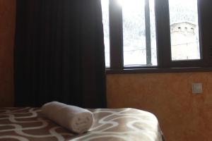 Katil atau katil-katil dalam bilik di Maia's Guesthouse