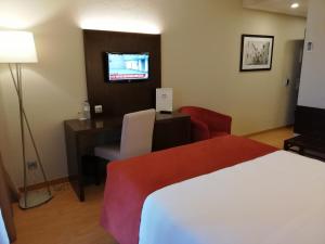 Кровать или кровати в номере Hotel Monaco