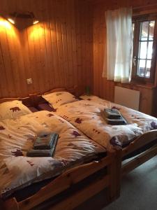 a bedroom with a large bed in a room at Chalet Michel in Bruson