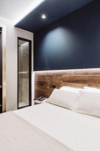 Postel nebo postele na pokoji v ubytování Hotel Europa