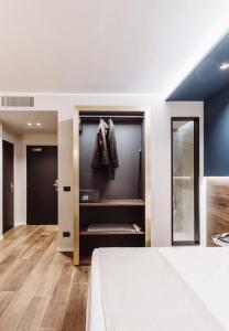 Postel nebo postele na pokoji v ubytování Hotel Europa