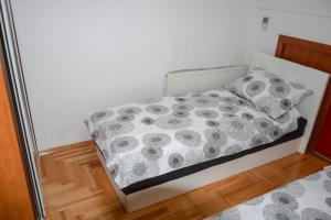 Postel nebo postele na pokoji v ubytování Apartman MAŠA
