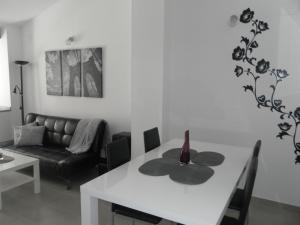 Posedenie v ubytovaní Carrer de Dénia