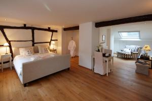 Postel nebo postele na pokoji v ubytování B&B Hof van Vervoering