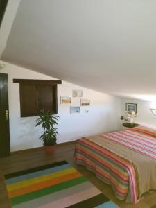 מיטה או מיטות בחדר ב-Casa Papi
