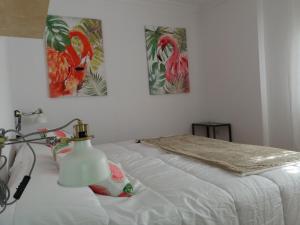 Postel nebo postele na pokoji v ubytování Urban home Aridane 1