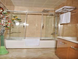 A bathroom at Alfa Hotel Még 30 kép