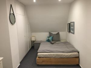 Una cama o camas en una habitación de 23 Fielweg