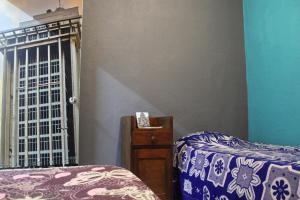 Postel nebo postele na pokoji v ubytování Casa en el centro de veracruz