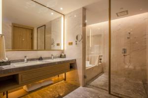 Vannituba majutusasutuses Nanan Ao Sheng Yi Hao Hotel