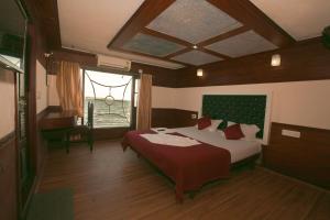 Harmony Houseboats客房内的一张或多张床位
