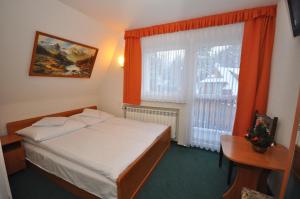 Posteľ alebo postele v izbe v ubytovaní Hostel Gawra