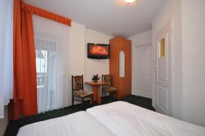 Posteľ alebo postele v izbe v ubytovaní Hostel Gawra