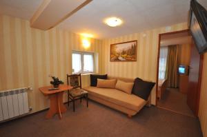 Televízia a/alebo spoločenská miestnosť v ubytovaní Hostel Gawra