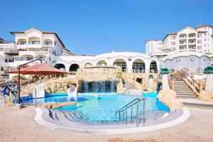 a water park at a resort with a waterfall at Sol Beach Yangyang in Yangyang