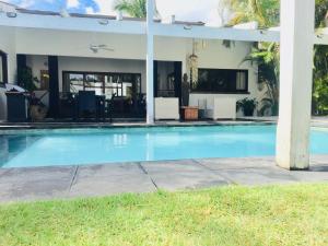 A piscina localizada em EXOTIC VILLA II - Three Bedroom Villa in Juan Dolio Beach ou nos arredores
