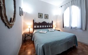 A bed or beds in a room at Villa Mediterranea