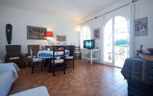 A television and/or entertainment centre at Villa Mediterranea