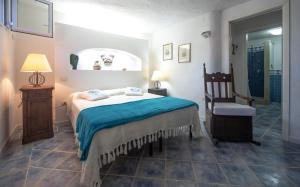 A bed or beds in a room at Villa Mediterranea