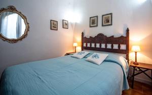 A bed or beds in a room at Villa Mediterranea