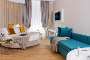 A bed or beds in a room at Navona Style