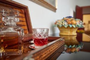 Nápoje v ubytovaní Le Balze Appartamenti