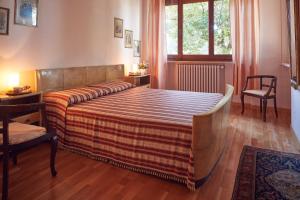 Posteľ alebo postele v izbe v ubytovaní Le Balze Appartamenti