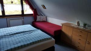 Postel nebo postele na pokoji v ubytování Birkenhain