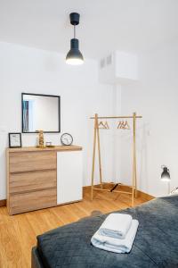 Postel nebo postele na pokoji v ubytování Gold Apartments Your Holiday Home