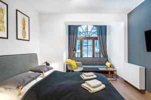 Postel nebo postele na pokoji v ubytování Gold Apartments Your Holiday Home