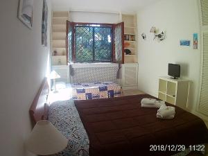 Postel nebo postele na pokoji v ubytování La casa di Nataly