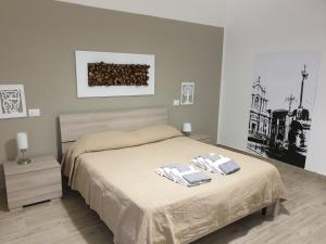 Ein Bett oder Betten in einem Zimmer der Unterkunft Casa Gialli