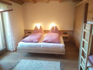 Letto o letti in una camera di Bauernhof Hintenberg