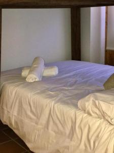Postel nebo postele na pokoji v ubytování Maribel Arttyco