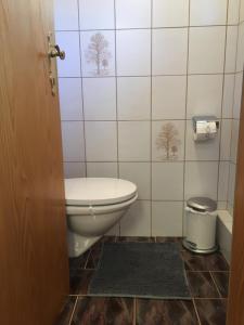 Koupelna v ubytování Haus am See + 12 fotografií