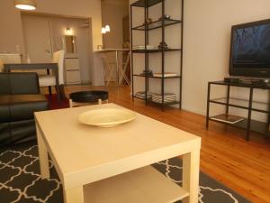 a living room with a table with a plate on it at Apartment in the city center in Thessaloniki