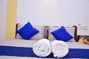 Letto o letti in una camera di Ocean Gate Villa Tangalle