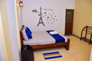 Letto o letti in una camera di Ocean Gate Villa Tangalle