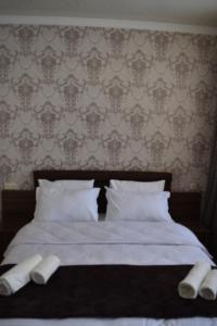 Rúm í herbergi á Hotel IVERIA
