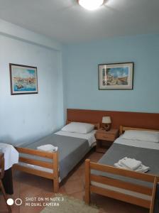Katil atau katil-katil dalam bilik di Guest House Fosa