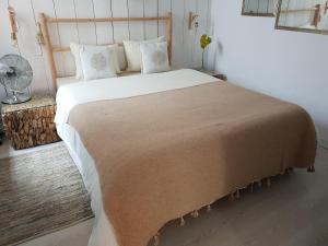 מיטה או מיטות בחדר ב-Old Charming House Faro