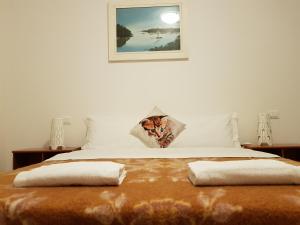 Postel nebo postele na pokoji v ubytování Rosa Garden B&B