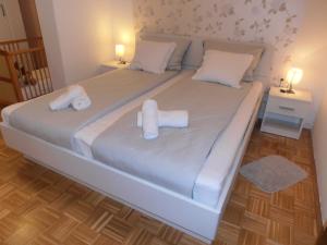 Postel nebo postele na pokoji v ubytování Apartment Steblaj