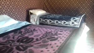 Tempat tidur dalam kamar di Bivouac Dune Iriki