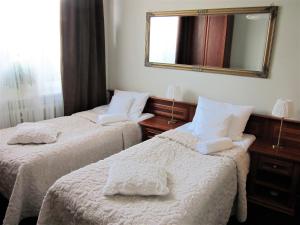 Posteľ alebo postele v izbe v ubytovaní Centrum, 700m do plaży - 2 sypialnie, salon, balkon, bezpłatny parking,