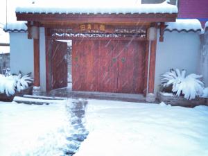Tian Jia Xiao Yuan Boutique Homestay durante el invierno