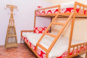 Postel nebo postele na pokoji v ubytování Hostel Swastik