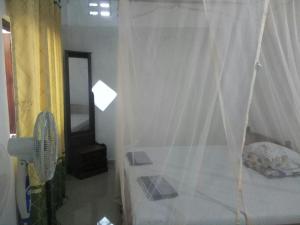 Hansa Villa tesisinde bir odada yatak veya yataklar