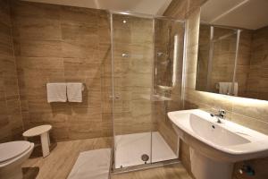 Koupelna v ubytování Relax Inn Hotel