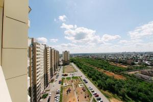 a view of a city with cars parked on a street at Apartment on Mira 3/1 in Orenburg